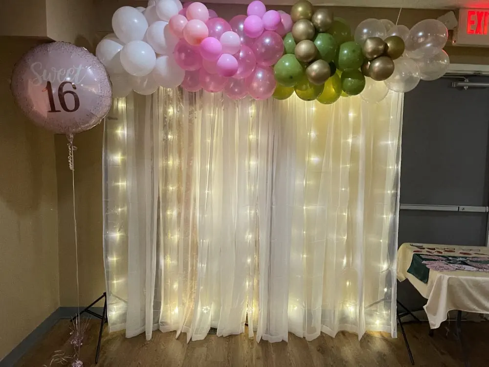 MJ's Events and Photo Booth Rentals - Balloon backdrop 4  - ransform your event with MJ's stunning balloon walls, columns, and decorations. Whether for a grand entrance or an eye-catching centerpiece, our vibrant designs add a fun and personalized touch to any celebration.